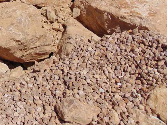 Bulk pile of landscape rock sold by the ton