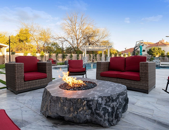 Compact fire pit rock seating area