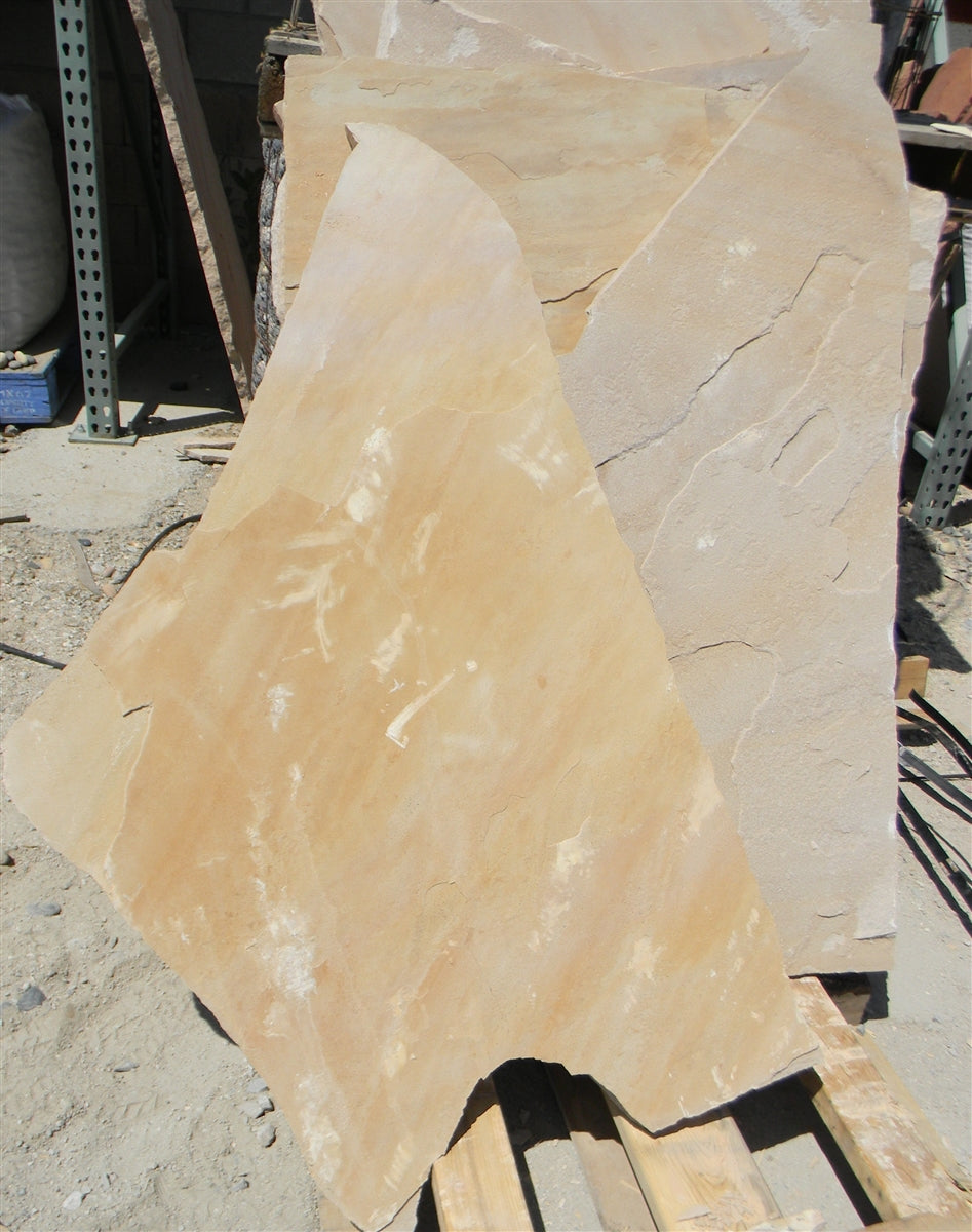 Arizona Buff Flagstone Standup 1" grade, large select flagstone slabs stood on edge and strapped for delivery
