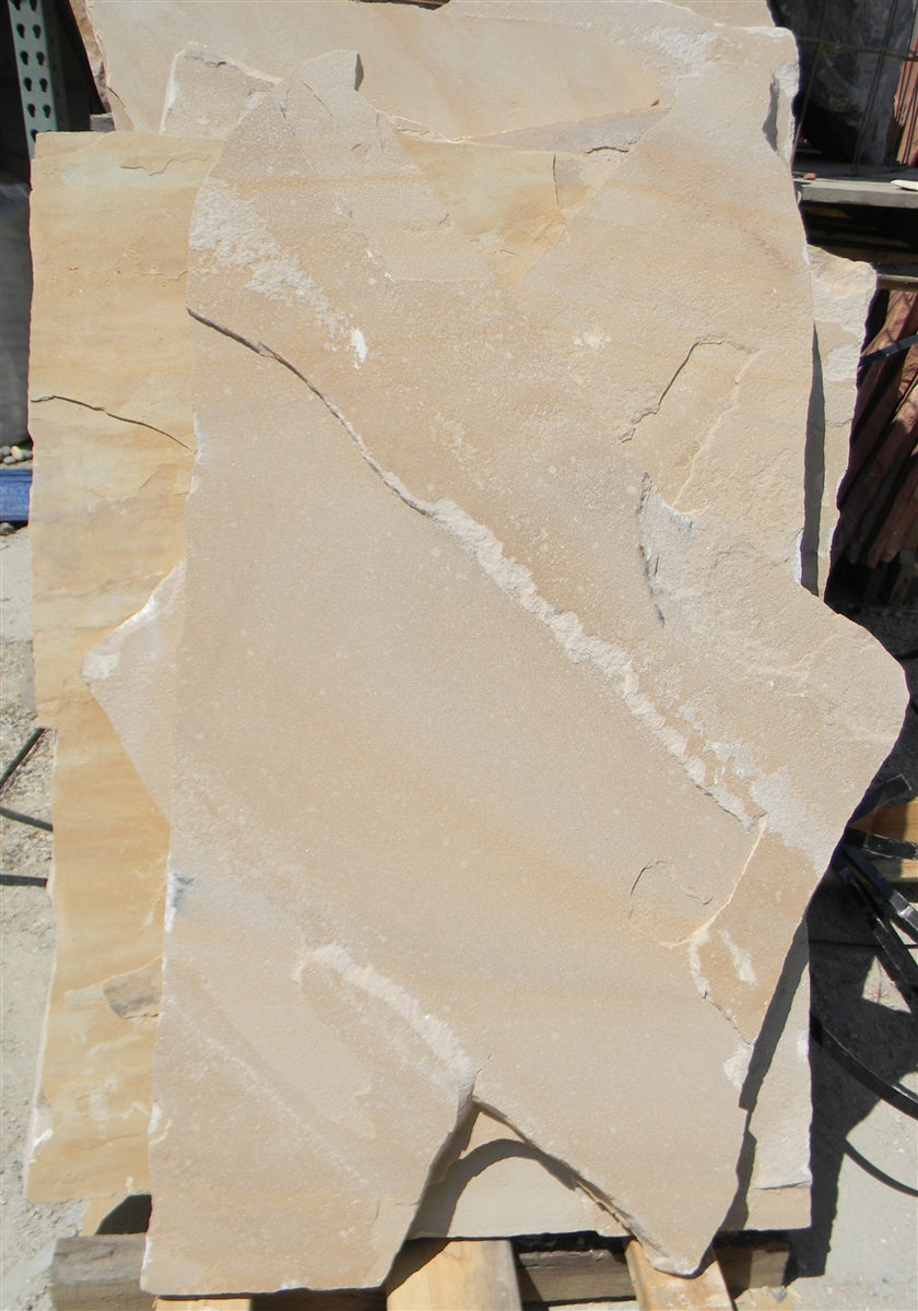 Arizona Buff Flagstone Standup 1" grade, large select flagstone slabs stood on edge and strapped for delivery