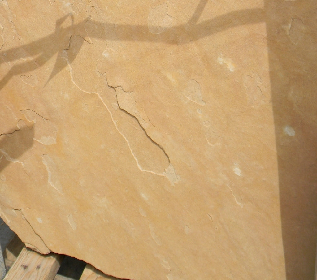 Arizona Gold Buckskin Flagstone Standup 1" grade, large select flagstone slabs stood on edge and strapped for delivery