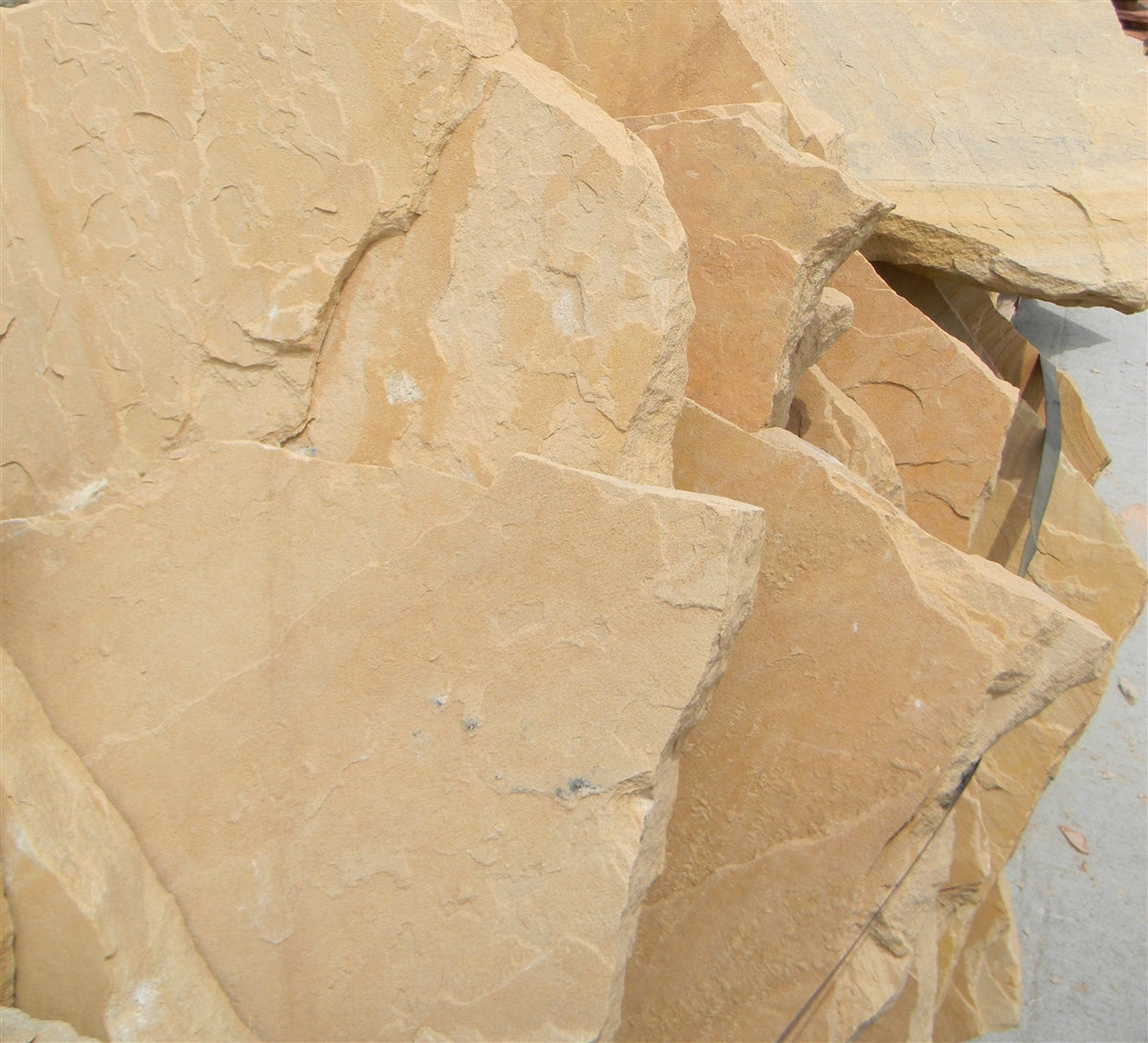 Arizona Gold Buckskin Flagstone Standup 2" grade, large select flagstone slabs stood on edge and strapped for delivery