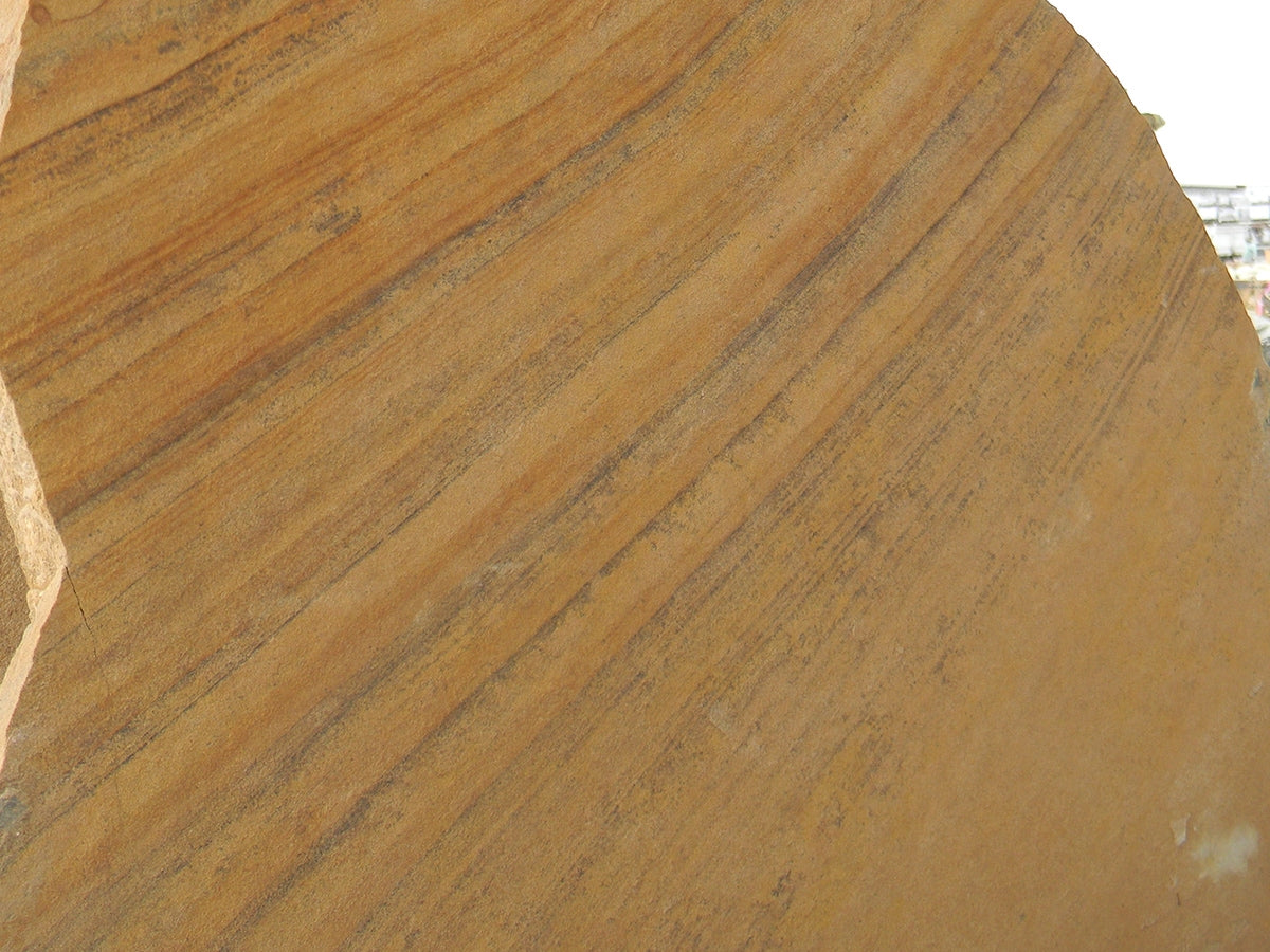 Arizona Buckskin Stripe & Swirl Flagstone Standup 2" grade, large select flagstone slabs stood on edge and strapped for delivery