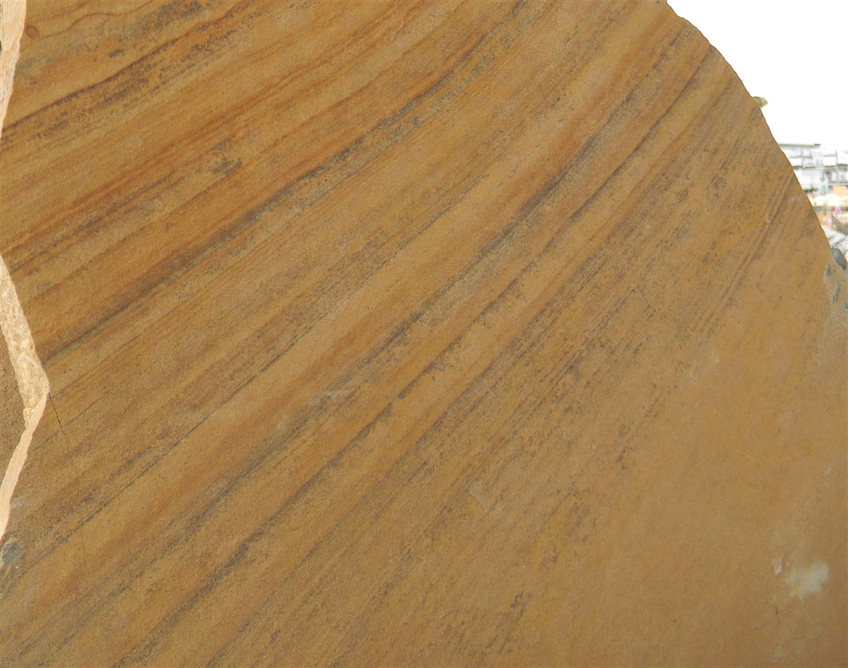 Arizona Buckskin Stripe & Swirl Flagstone Standup 2" grade, large select flagstone slabs stood on edge and strapped for delivery