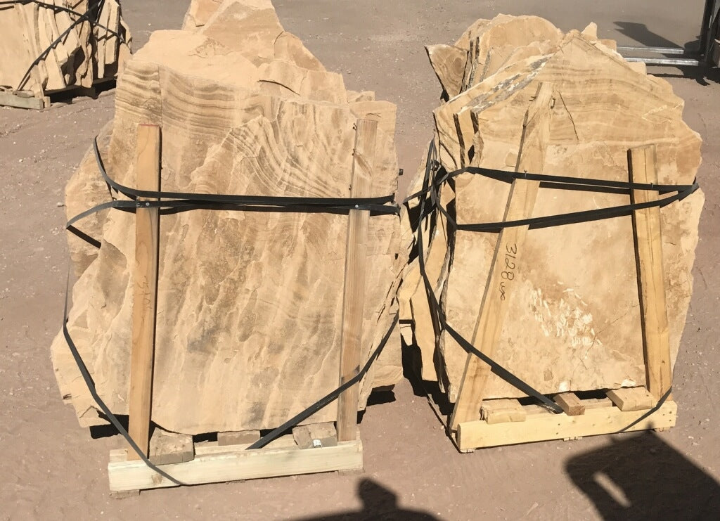 Arizona Buckskin Stripe & Swirl Flagstone Standup 2" grade, large select flagstone slabs stood on edge and strapped for delivery