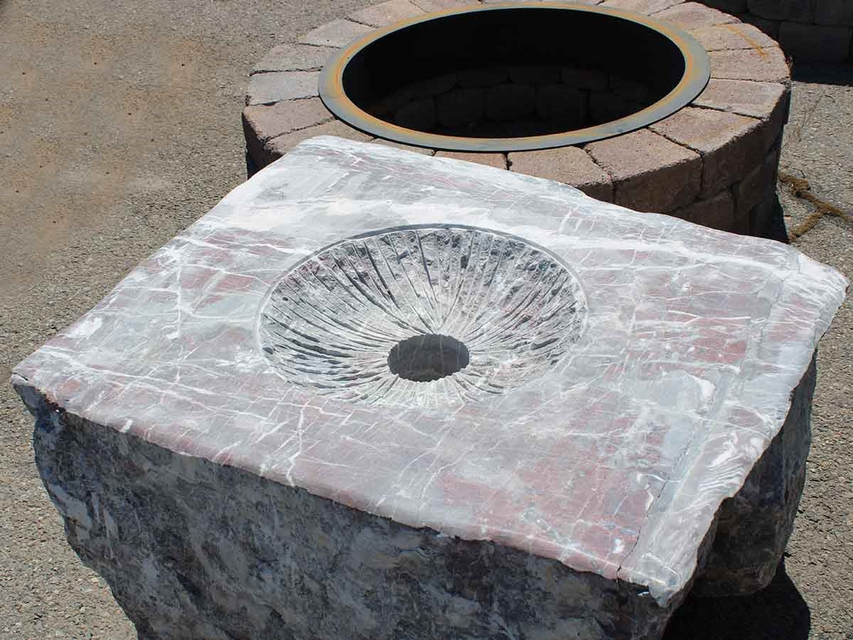 Rose grey marble boulder fire pit