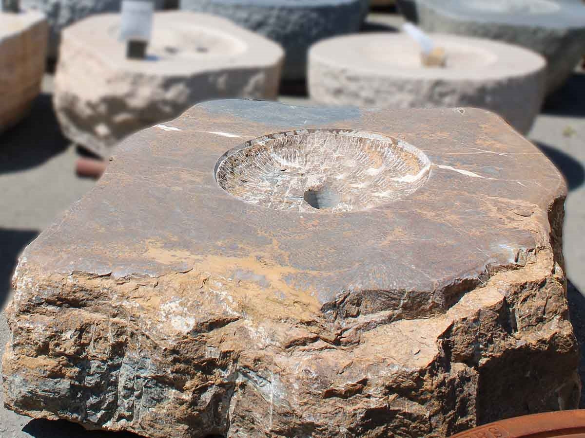 Natural stone boulder fire pit