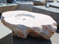 White marble boulder fire pit