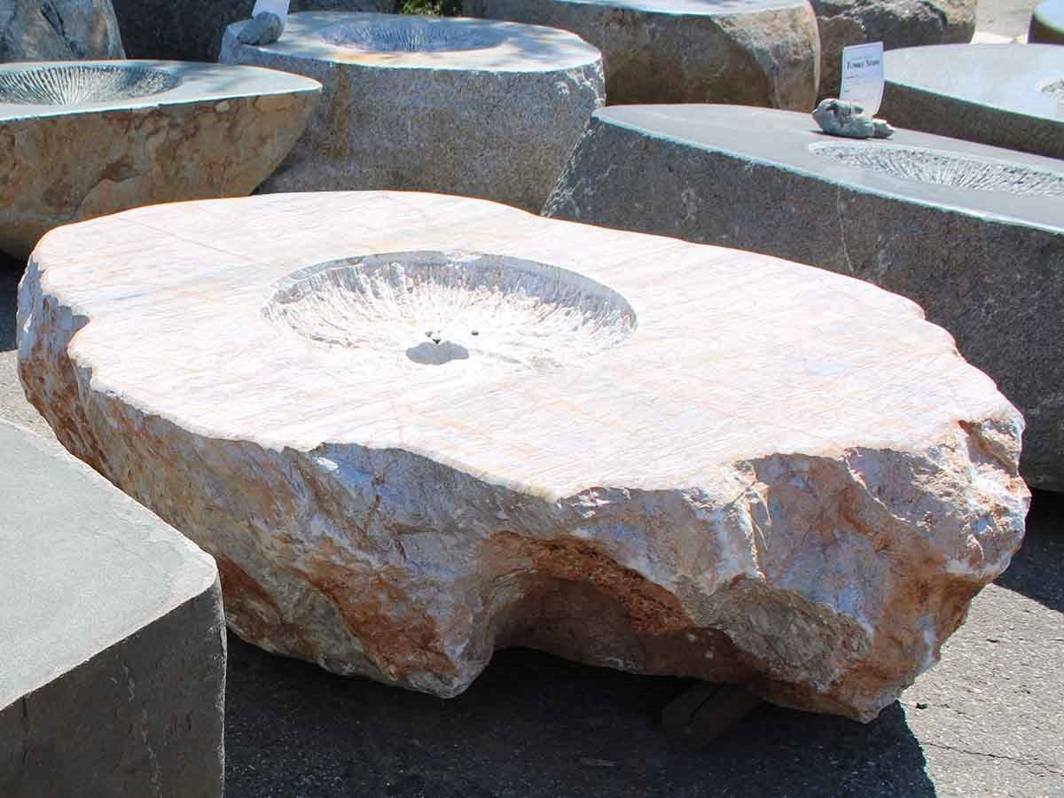 White marble boulder fire pit