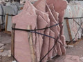 Arizona Rosa Flagstone Standup 1-3/4" grade, large select flagstone slabs stood on edge and strapped for delivery