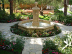 Lompoc Oatmeal Flagstone walkway circling a garden fountain