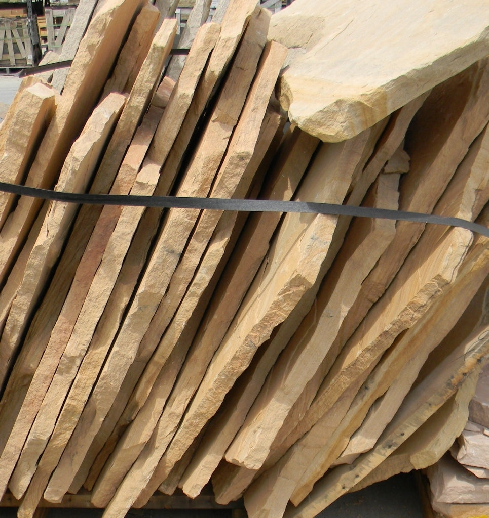 Arizona Buckskin Swirl Flagstone Standup 1-3/4" grade, large select flagstone slabs stood on edge and strapped for delivery