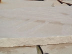 Arizona Buff Flagstone Standup 1-3/4" grade, large select flagstone slabs stood on edge and strapped for delivery