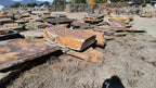Autumn Creek boulders, rows of gold, rust and gray slab boulders on pallets
