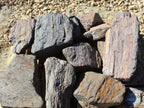 Barkwood natural landscape boulders in the 12 to 18 inch size class