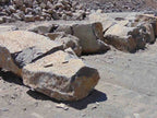 Black basalt landscaping boulders in a 3 foot size class at the Earth Stone Rock yard