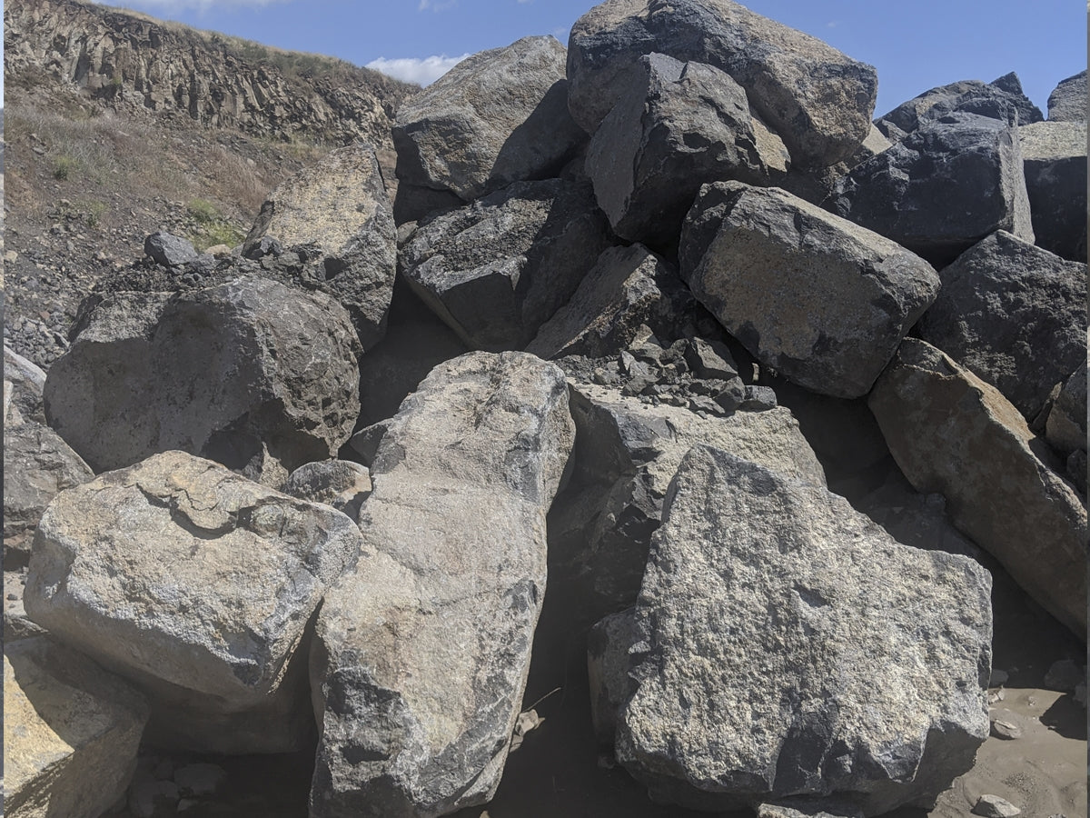 Large 5 foot black basalt landscape boulder for entry monuments and focal points