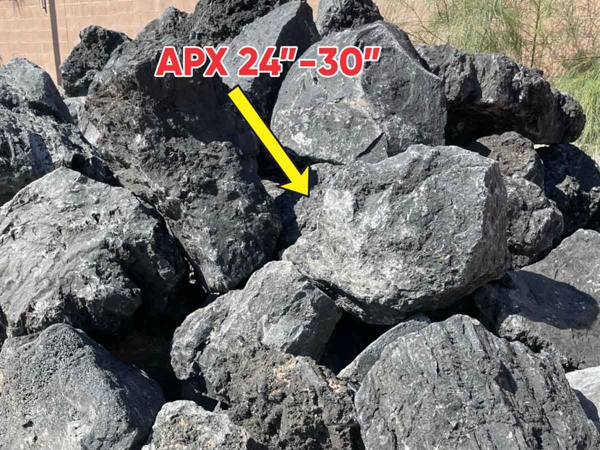 Black Lava Dark Star natural landscape boulders in the 24 to 30 inch size class