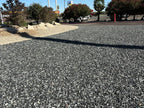 Wide view of Black n Silver Rock 1 inch installed as commercial landscape ground cover