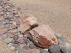 Champagne Granite landscape boulders, 18 to 24 inch size
