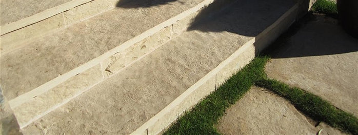Fossil Creek quartzite sandstone step treads installed as garden stairs with grass joints