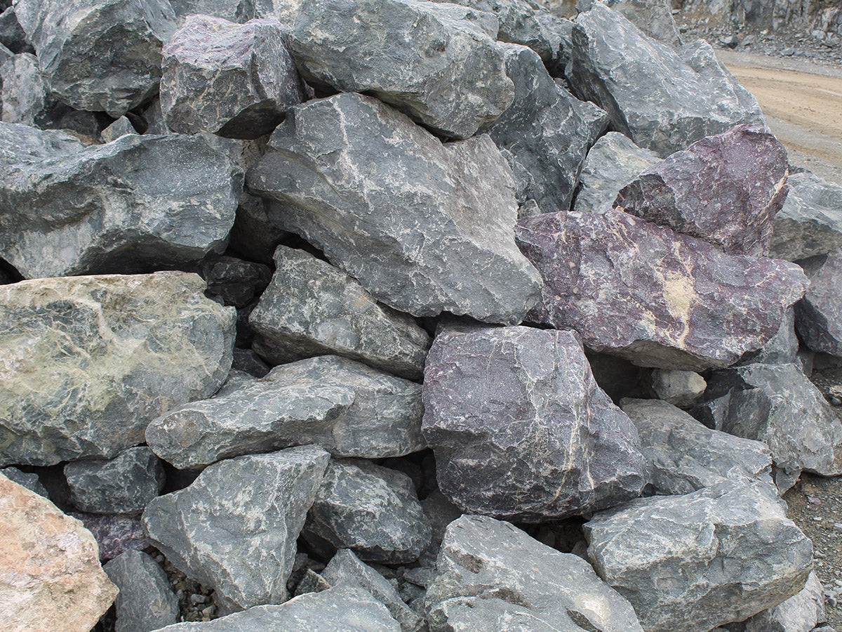 Lilac Spring natural landscape boulders in the 12 to 18 inch size class