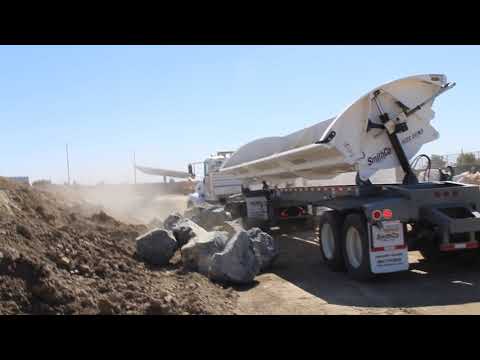 Side Dump Truck of Monsoon Season Boulders
