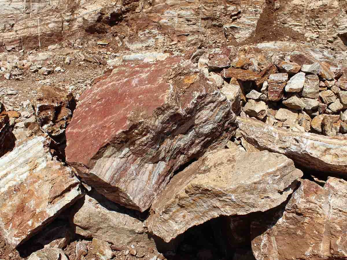 Red Rainbow Onyx natural landscape boulder, hand selected