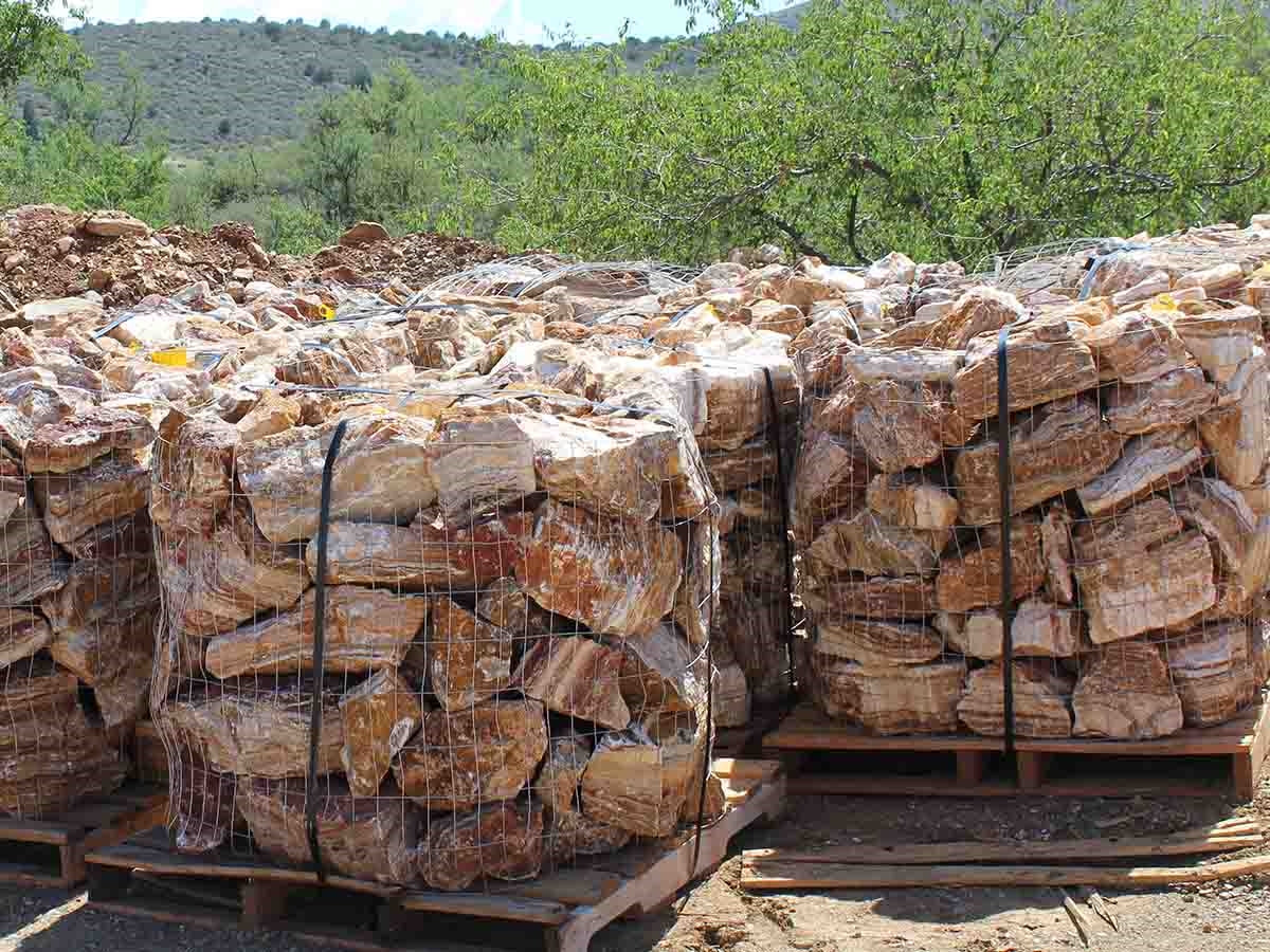 Red Rainbow Onyx specimen boulder shown at the yard