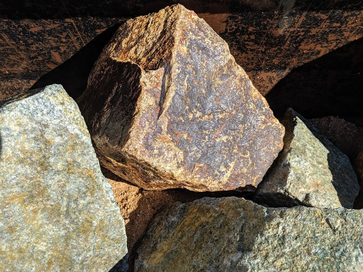 Shasta Blue n Gold Granite landscape boulders, 24 to 30 inch size