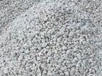 Ultra White Rock in the 1-1/2 inch size, a pile of crushed bright white landscape rock